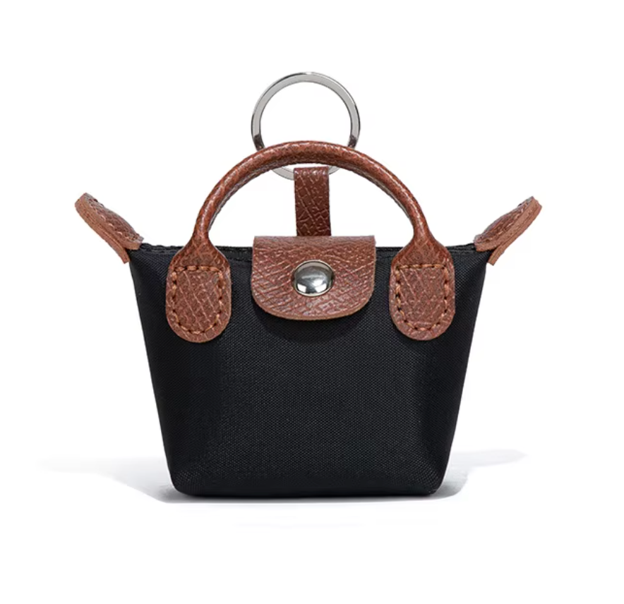 Longchamp 3-in-1 Mini -charm: avaimenperä, AirPods-kotelo & huulipunakotelo