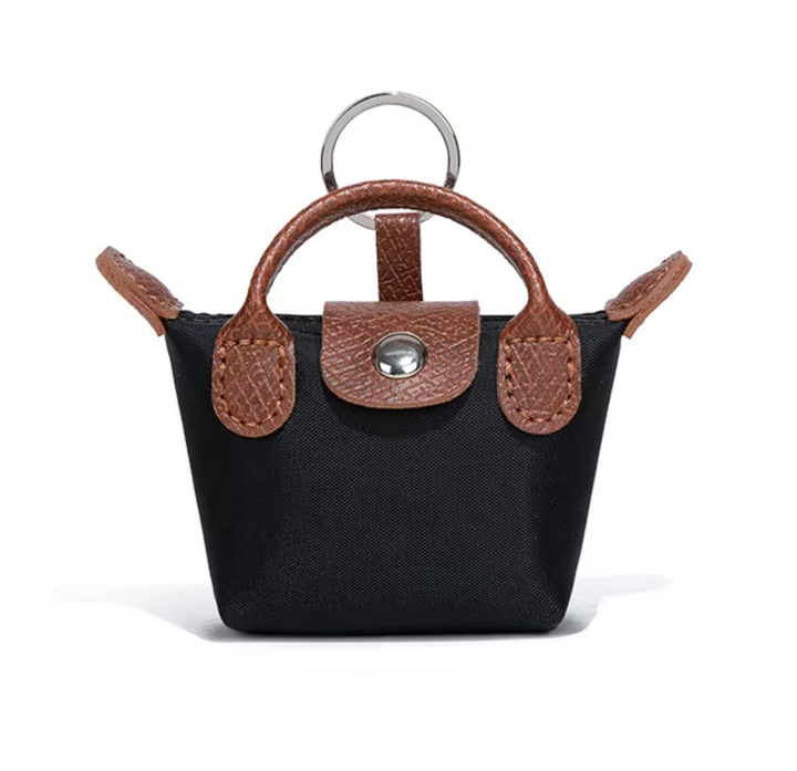 Longchamp 3-in-1 Mini -charm: avaimenperä, AirPods-kotelo & huulipunakotelo