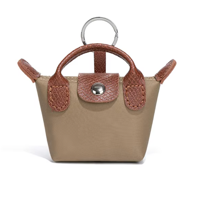 Longchamp 3-in-1 Mini -charm: avaimenperä, AirPods-kotelo & huulipunakotelo